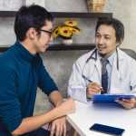 A doctor is talking with a patient